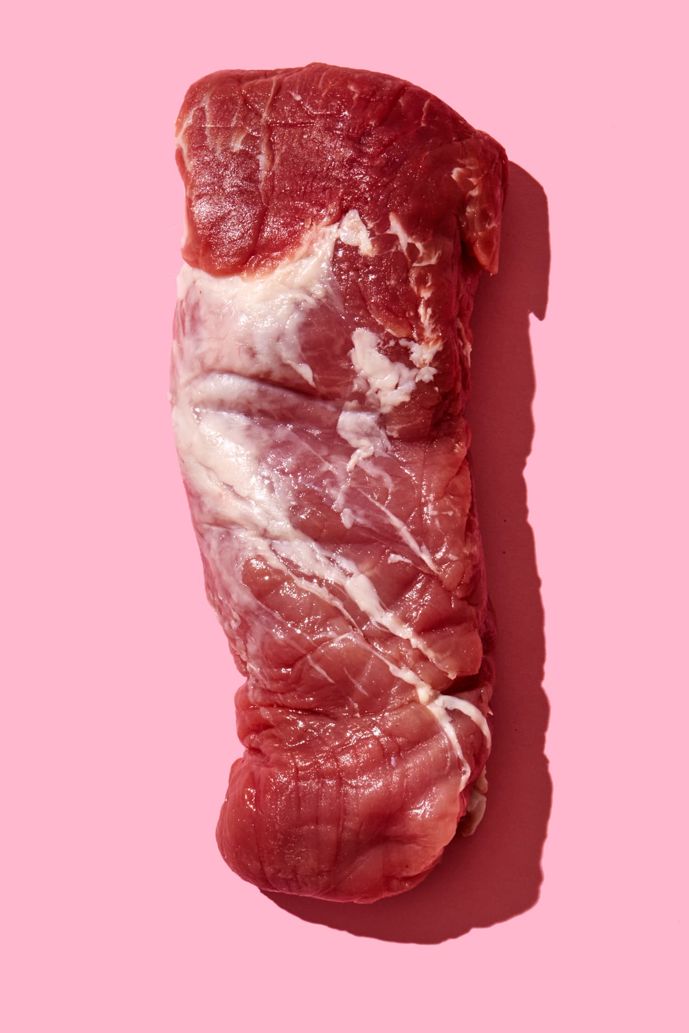 The USDA food pyramid was shaped by meat, dairy, and food industry lobbyists — who changed 'eat less meat' to 'have two or three servings'